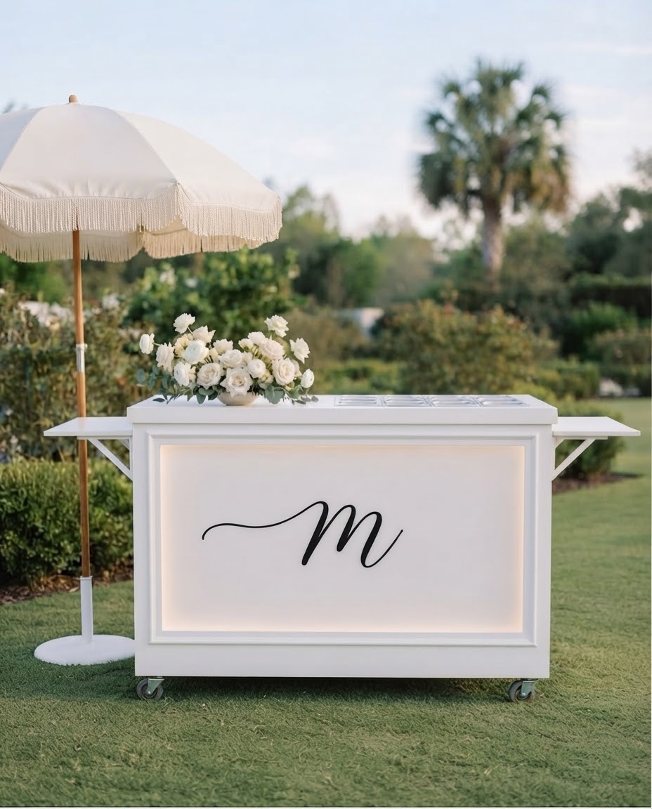 White mobile event cart set up outdoors for a wedding in Edmonton